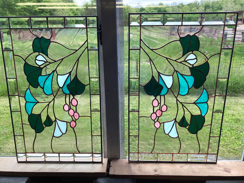 Custom window of ginko leaves.